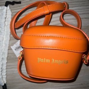 Palm angels cross body mini bag in orange, new with tags and dust bag.